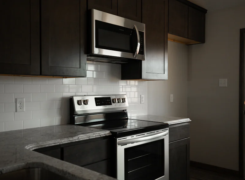 Silver and black microwave oven