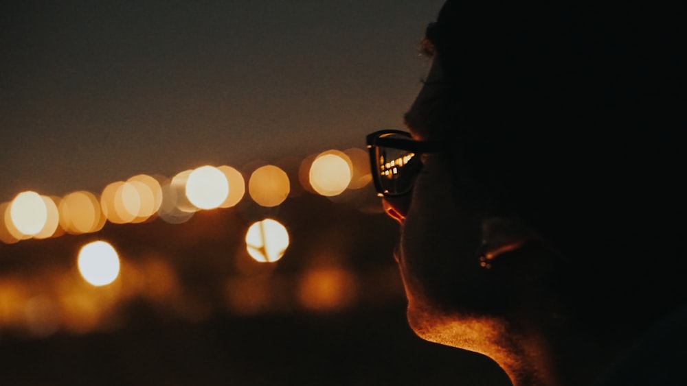 man wearing black framed eyeglasses