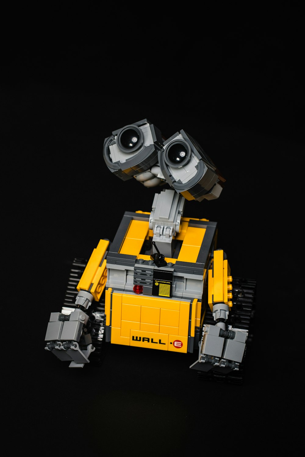 yellow and gray robot toy