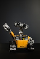 yellow and black robot toy