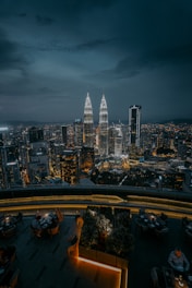 city with high rise buildings during night time