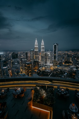 city with high rise buildings during night time