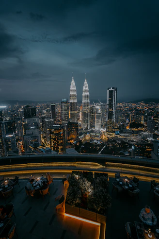 city with high rise buildings during night time
