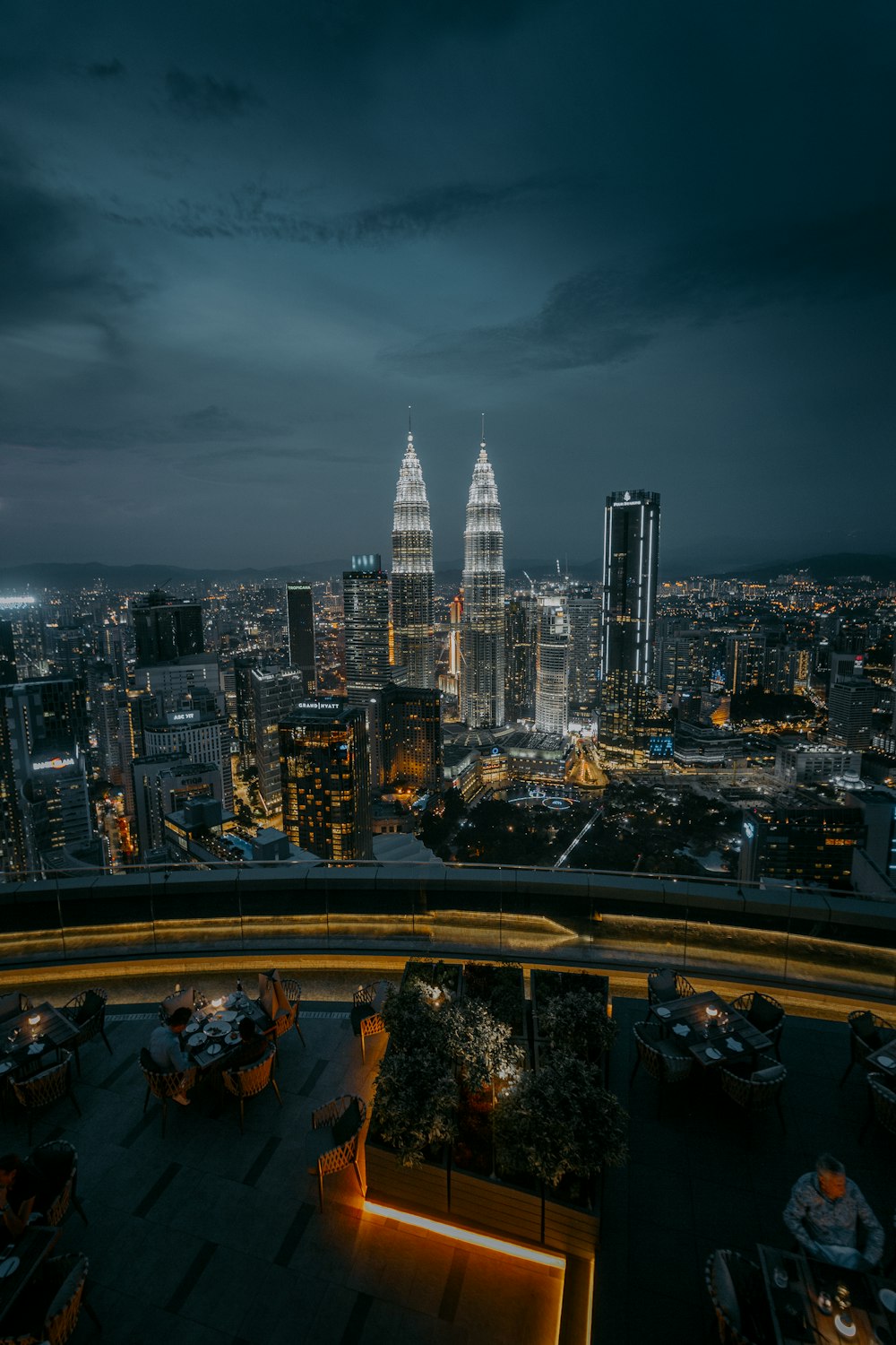 city with high rise buildings during night time