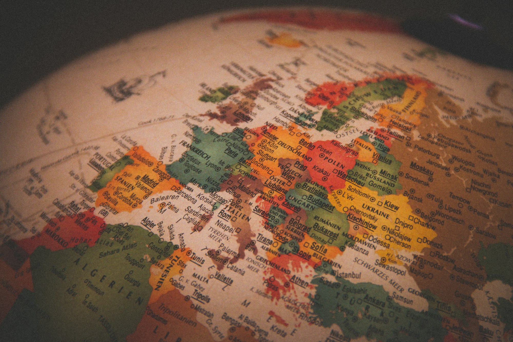Vintage globe with Europe in focus
