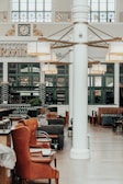 An indoor event space filled with stylish furniture for guests.