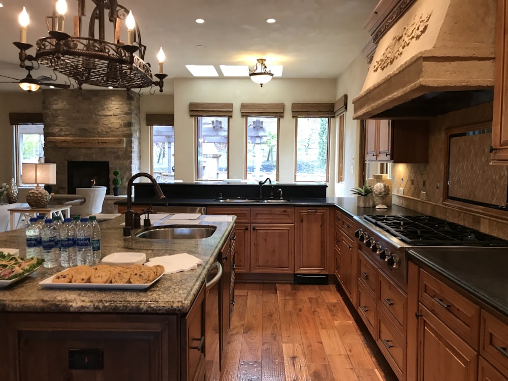 brown wooden kitchen cabinet with sink