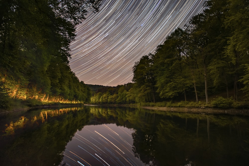 time lapse photography of river during night time