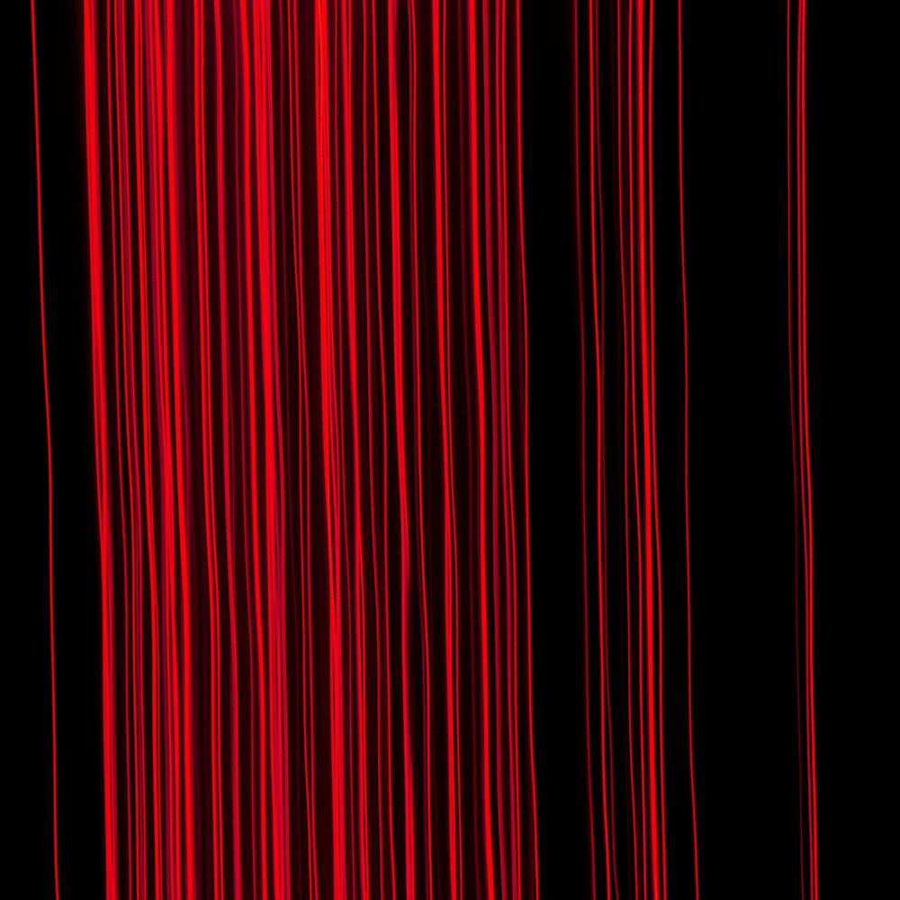 red and black striped textile