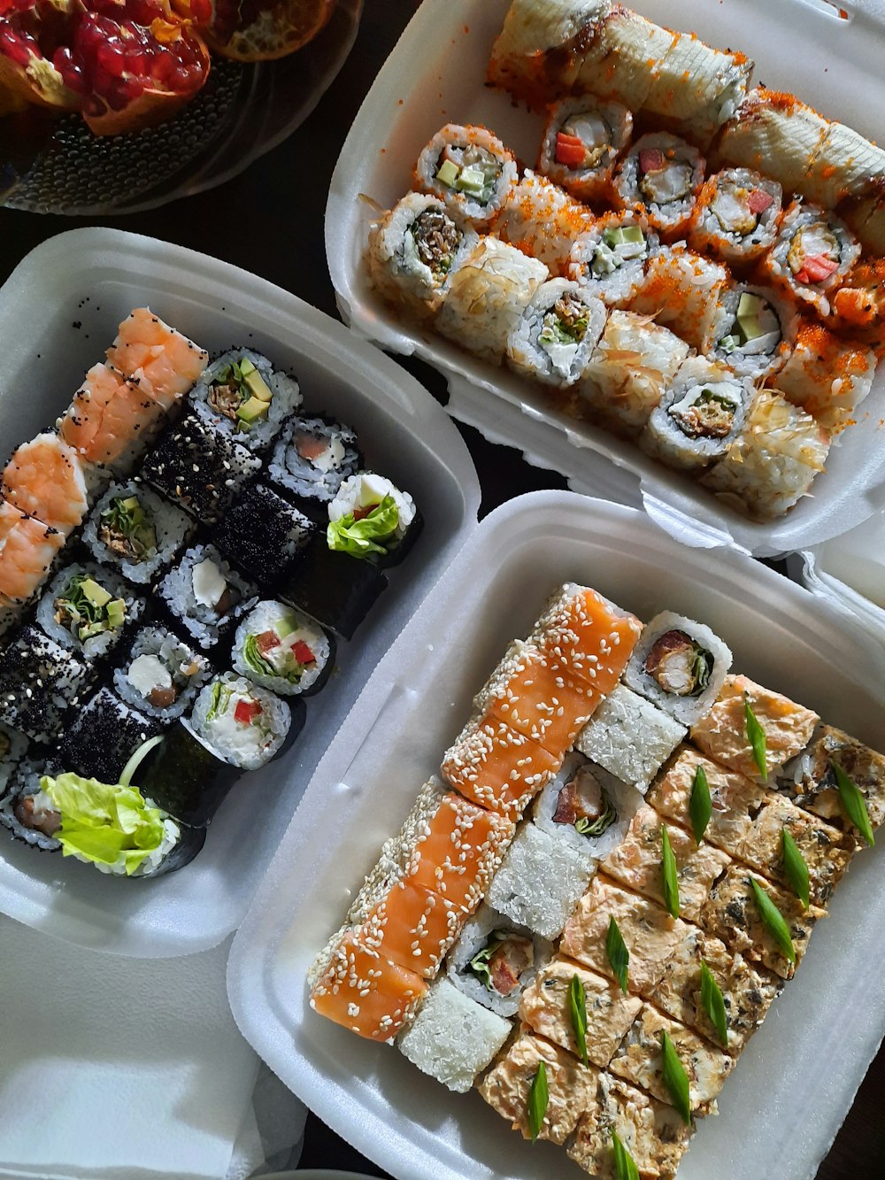 sushi on white plastic container