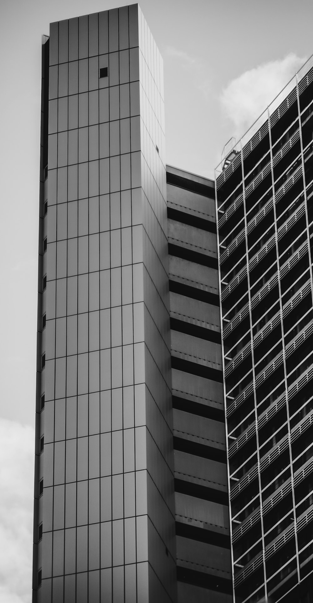 grayscale photo of high rise building