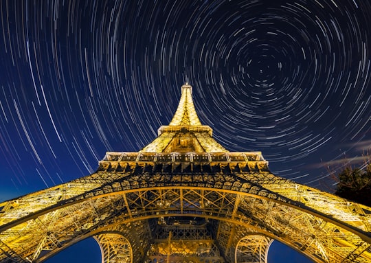 gold eiffel tower under blue sky in Eiffel Tower France