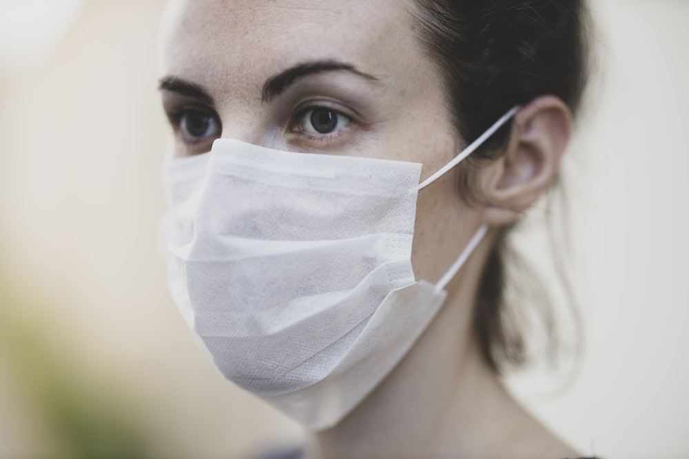 woman with white face mask