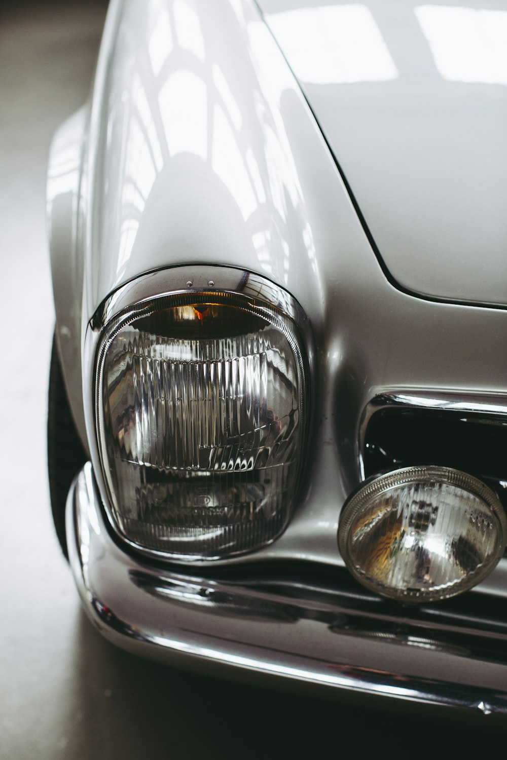 silver car with white light