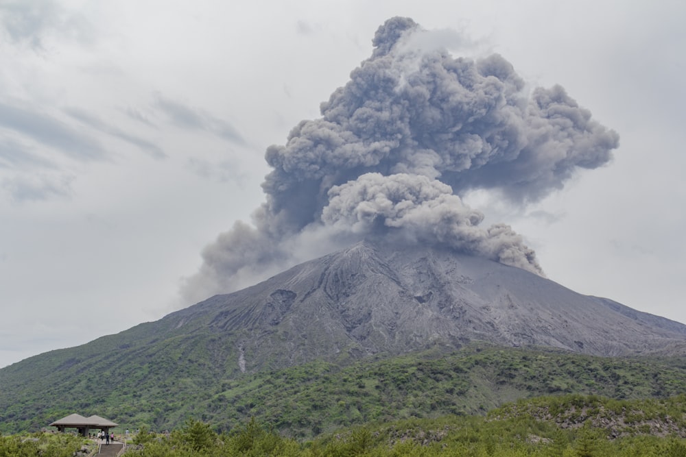 green and brown mountain under white clouds during daytime