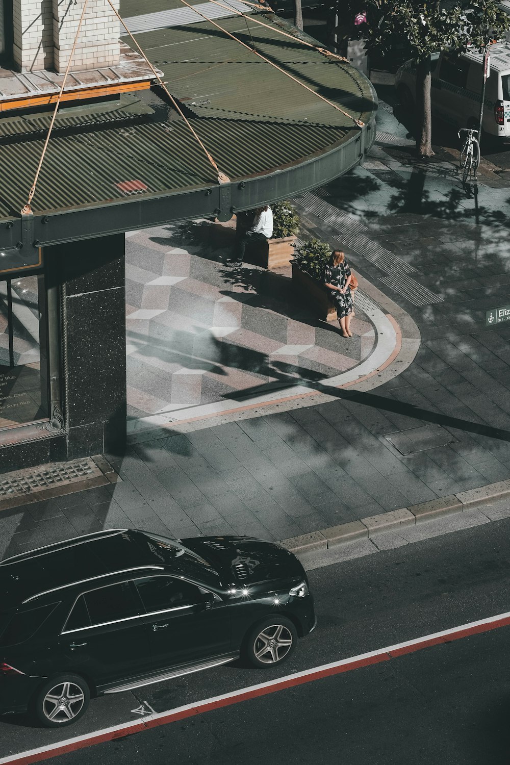 black car on road during daytime