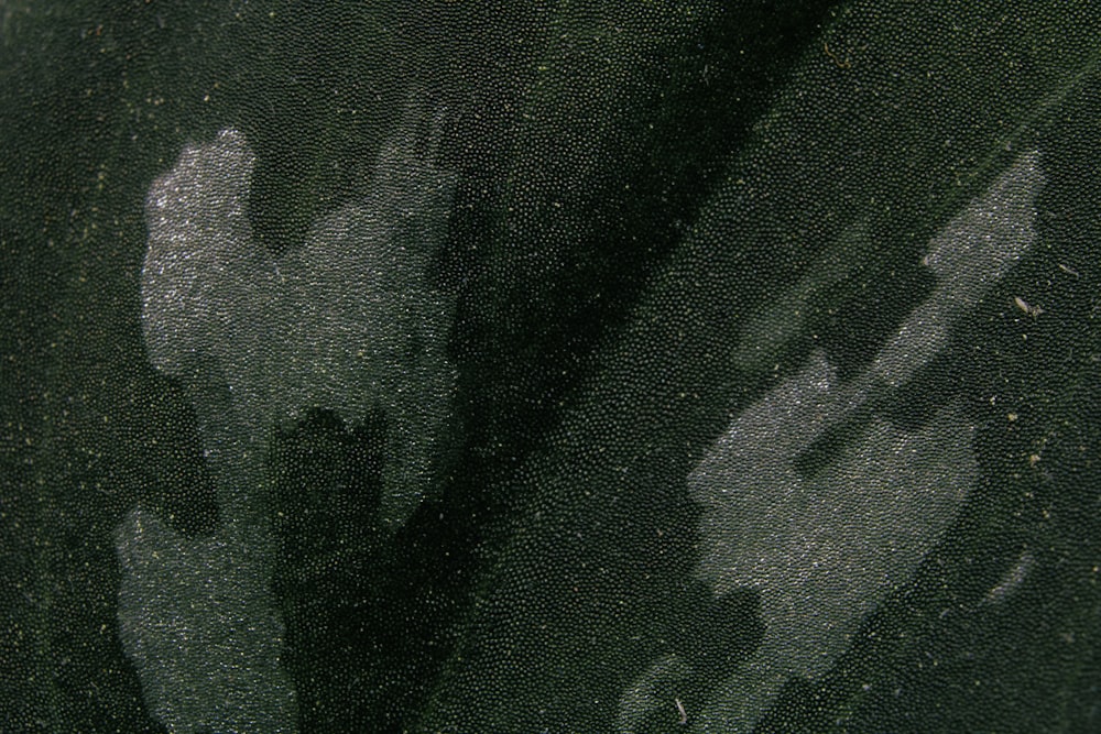 black and gray camouflage textile