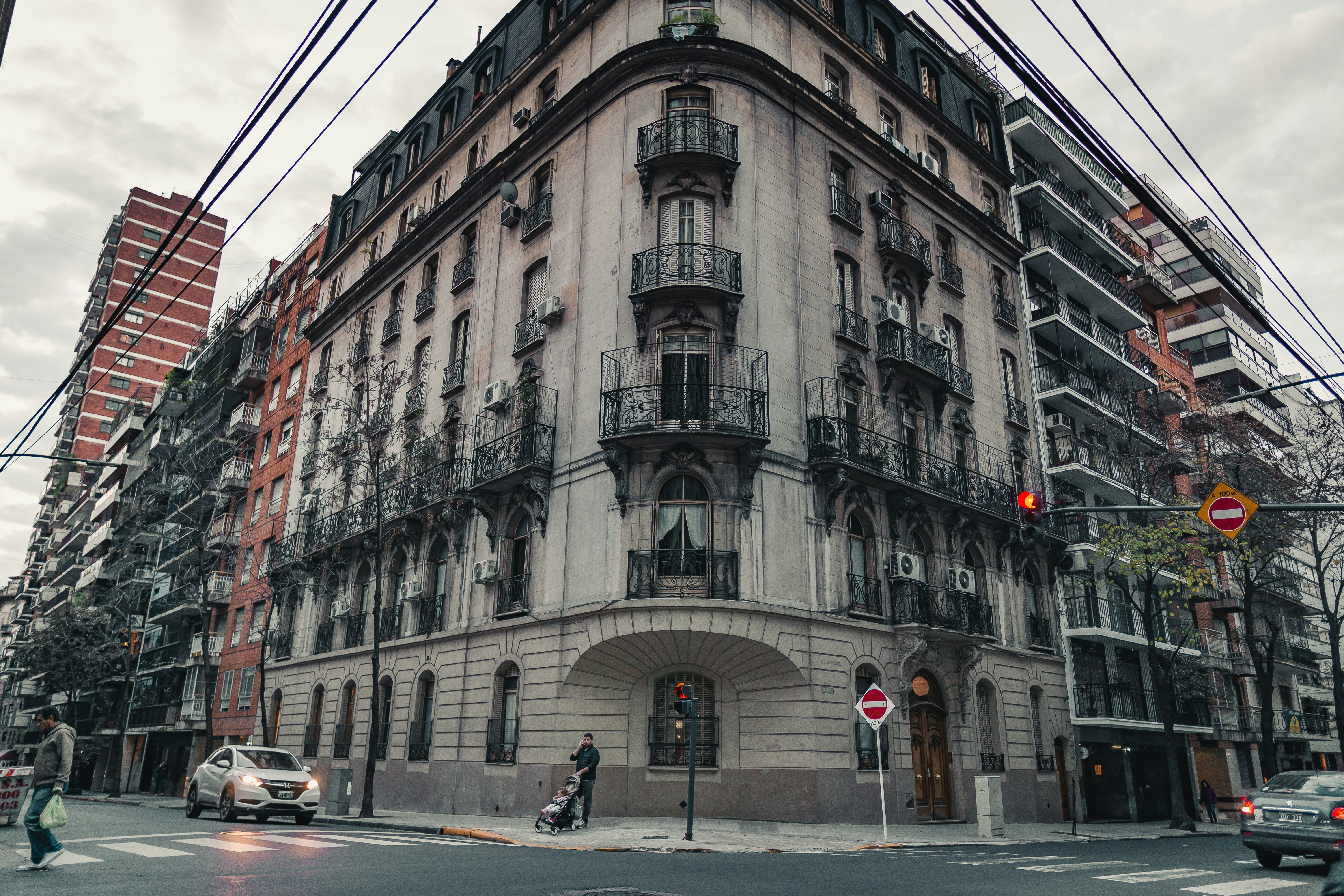 a tall building sitting on the corner of a street