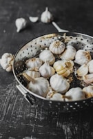 garlic on stainless steel bowl
