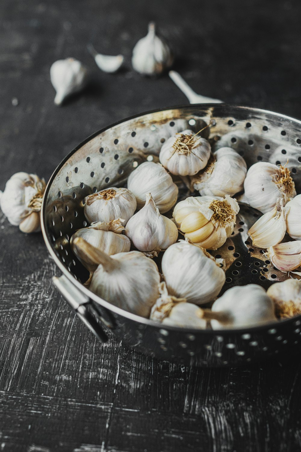 garlic on stainless steel bowl