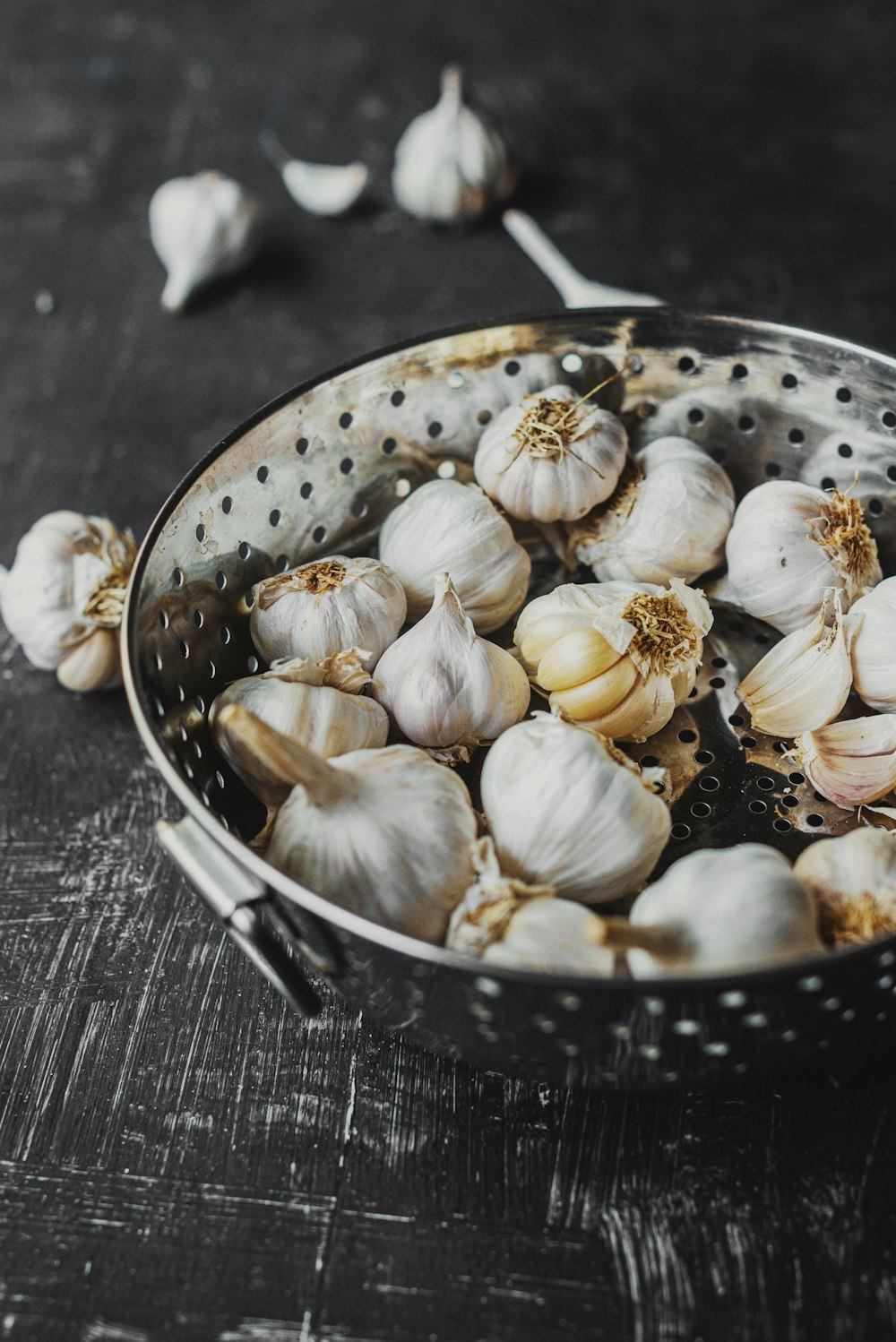 garlic on stainless steel bowl