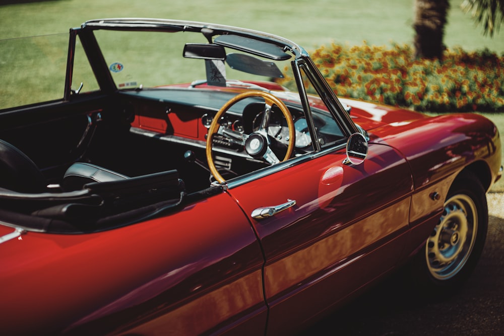 red and black convertible coupe