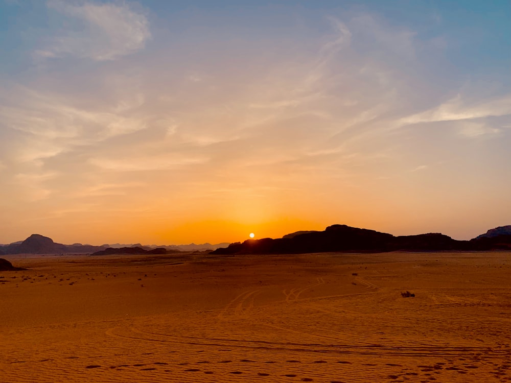 silhouette of mountain during sunset