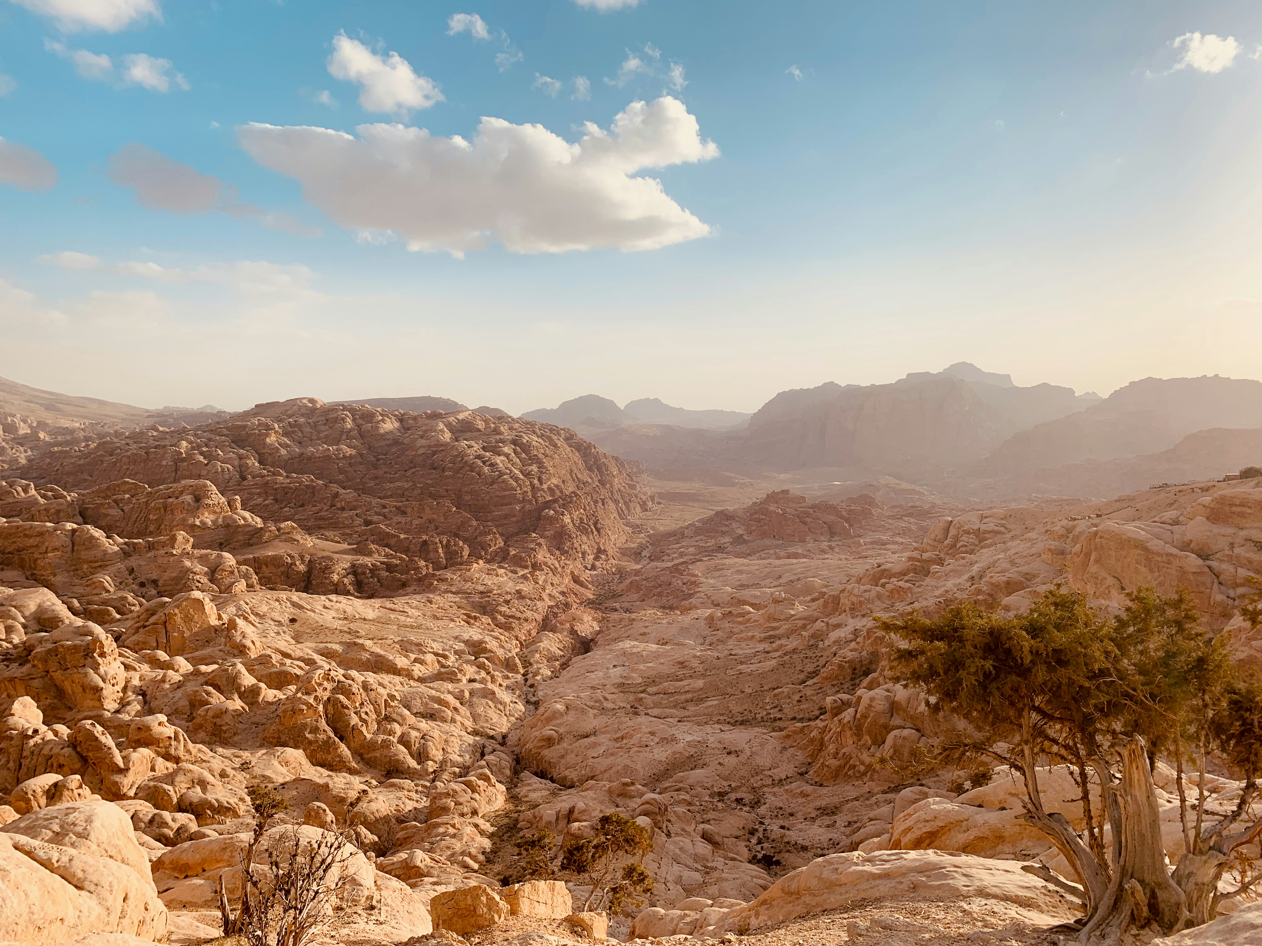 brown rocky mountain under blue sky during daytime