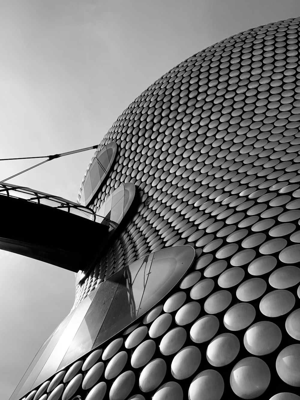 grayscale photo of round building