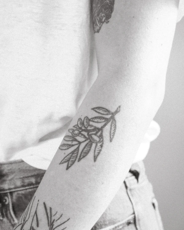Fine line bird tattoo