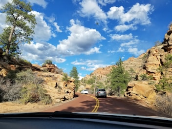 black suv on road during daytime