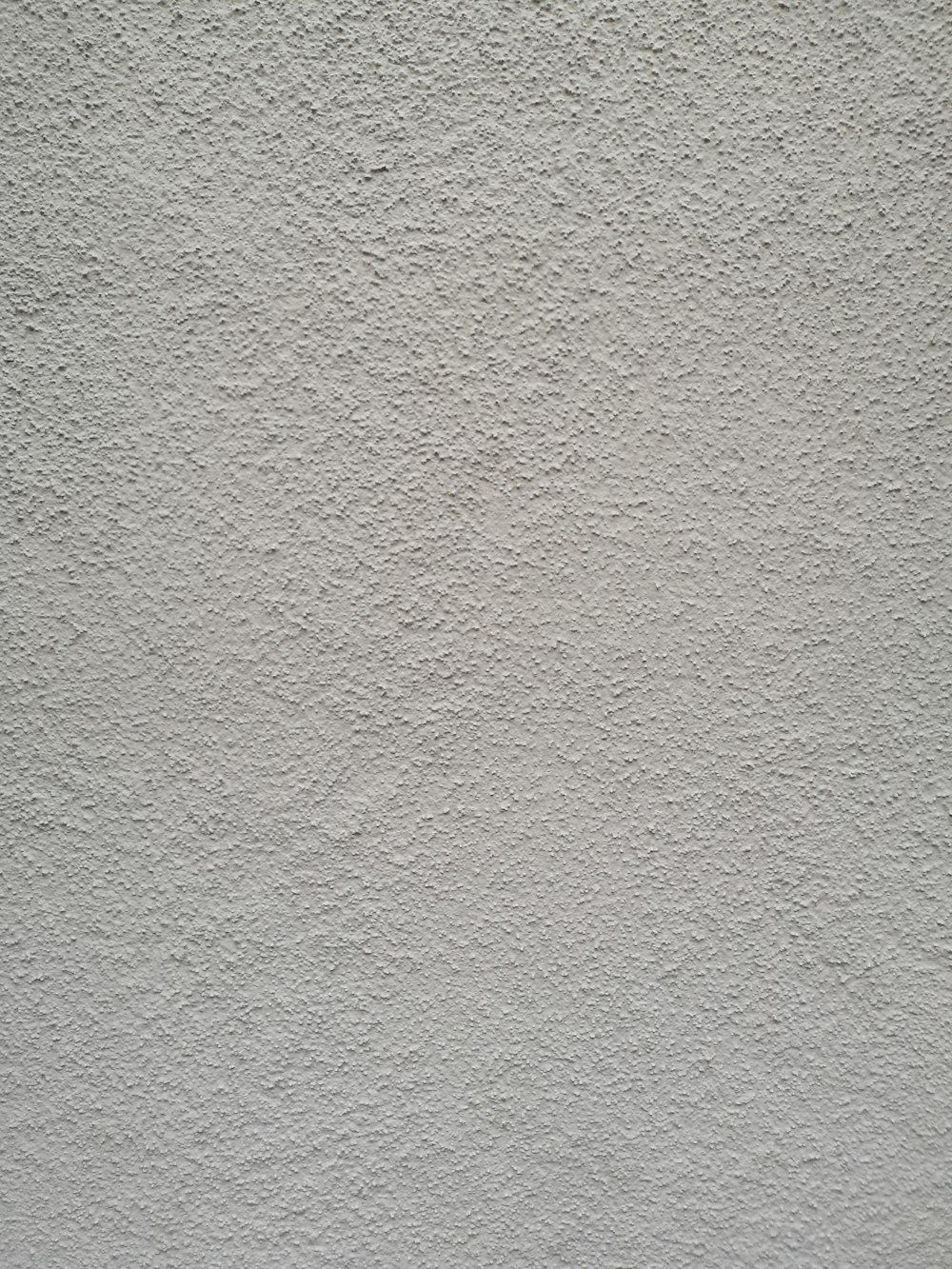 Pintura de pared blanca con textil negro