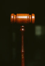 brown wooden pipe in dark room