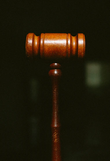 brown wooden pipe in dark room