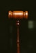 brown wooden pipe in dark room