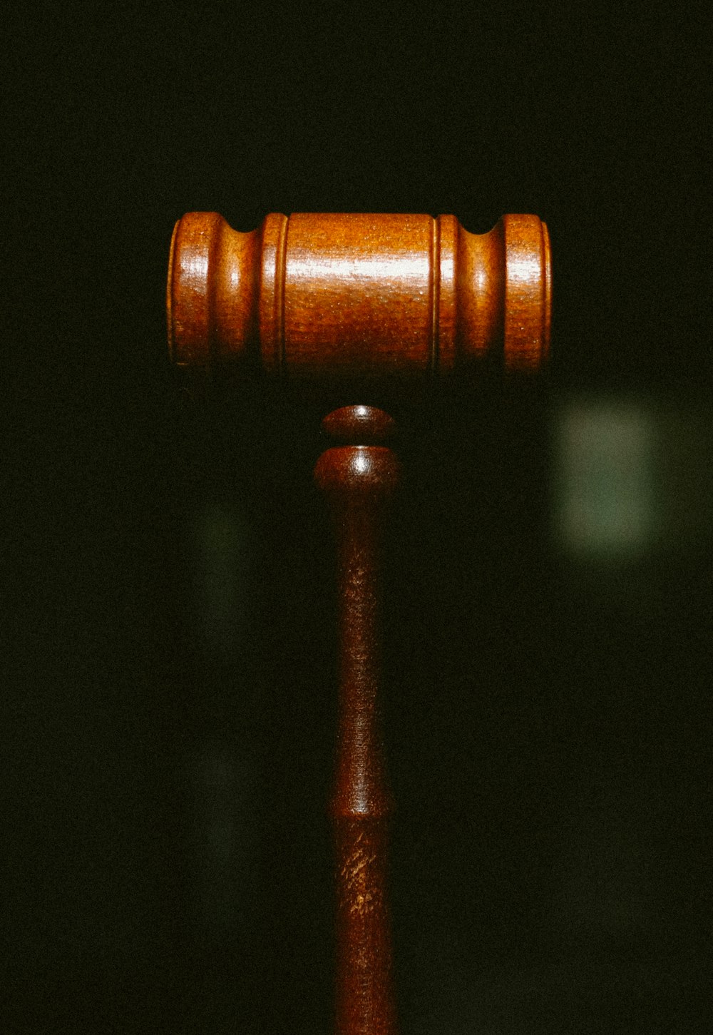 brown wooden pipe in dark room