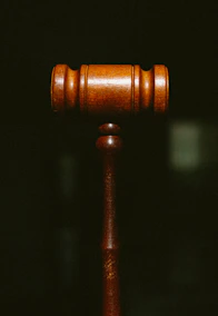 brown wooden pipe in dark room