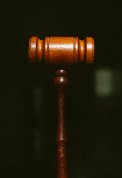 brown wooden pipe in dark room