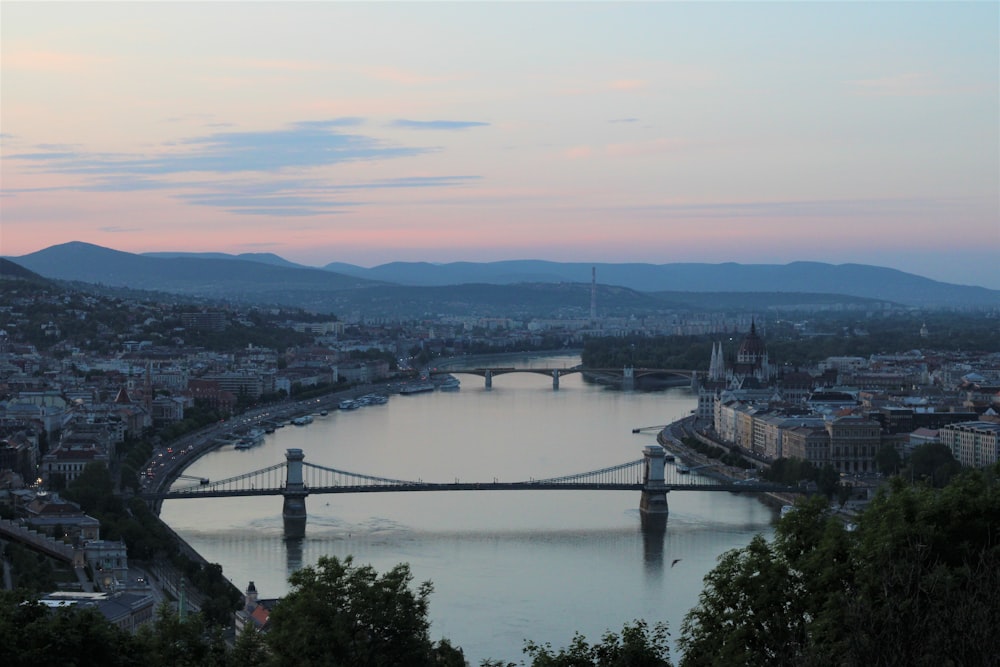 aerial view of bridge over river during daytime