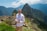 A happy traveler enjoying a scenic view in Guatemala.