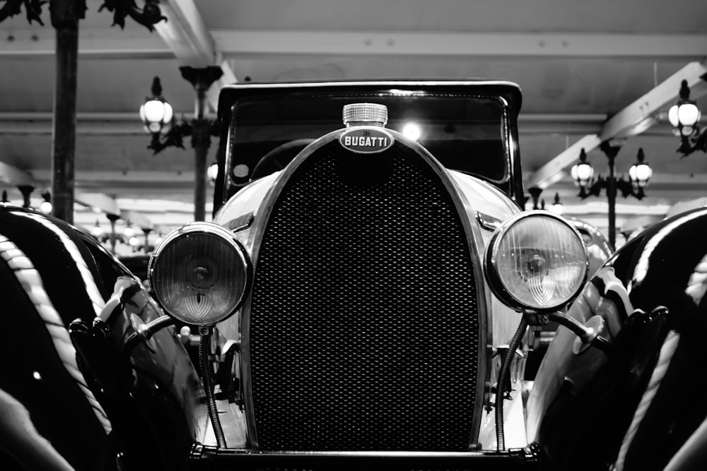 grayscale photo of vintage car