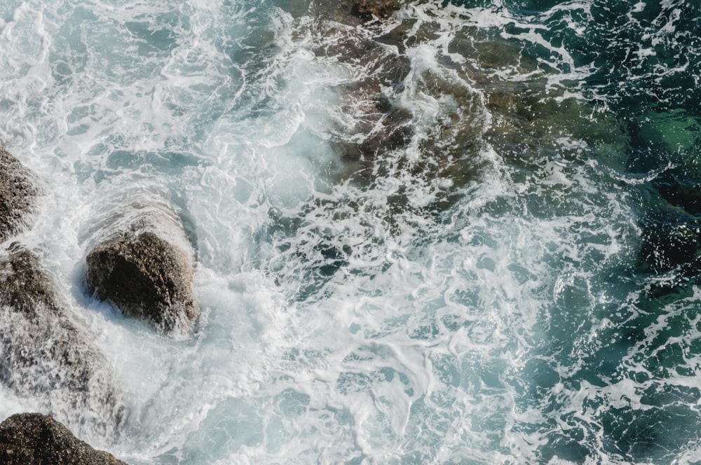 brown and white sea waves