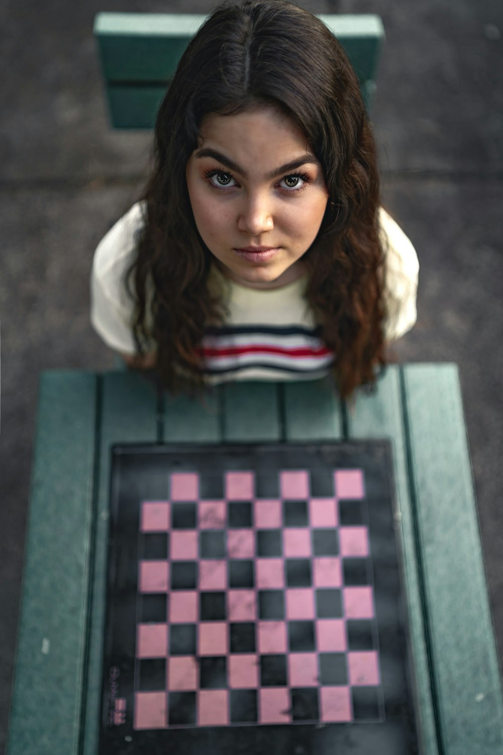 woman in white and black striped turtleneck shirt