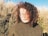woman in gray turtleneck sweater