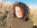 woman in gray turtleneck sweater