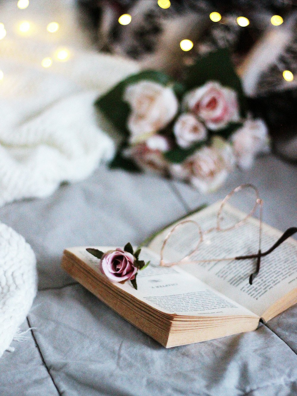 black framed eyeglasses on book page