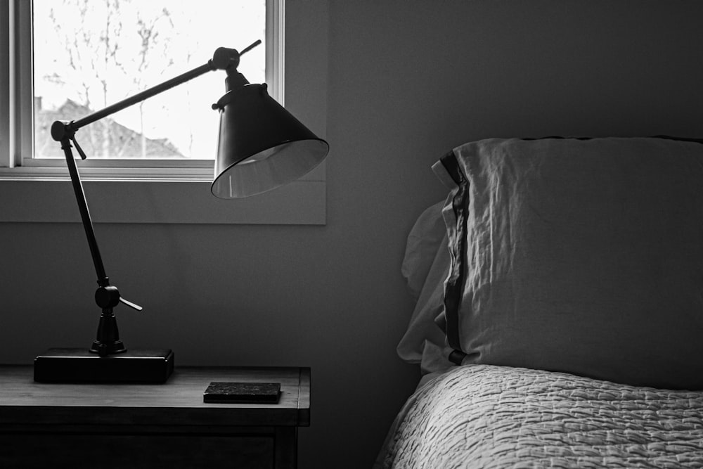 white table lamp on brown wooden table