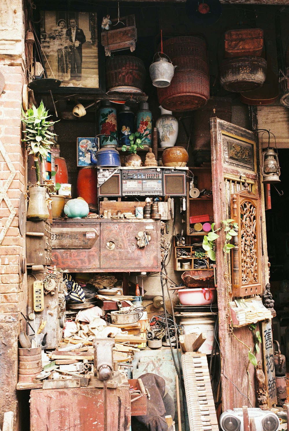 brown wooden cabinet with assorted items