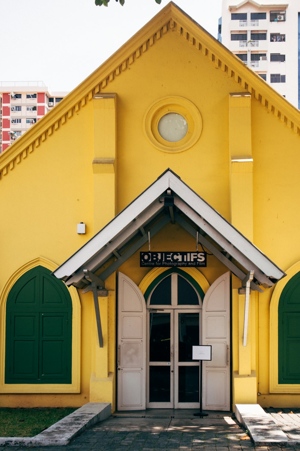 yellow and white concrete building