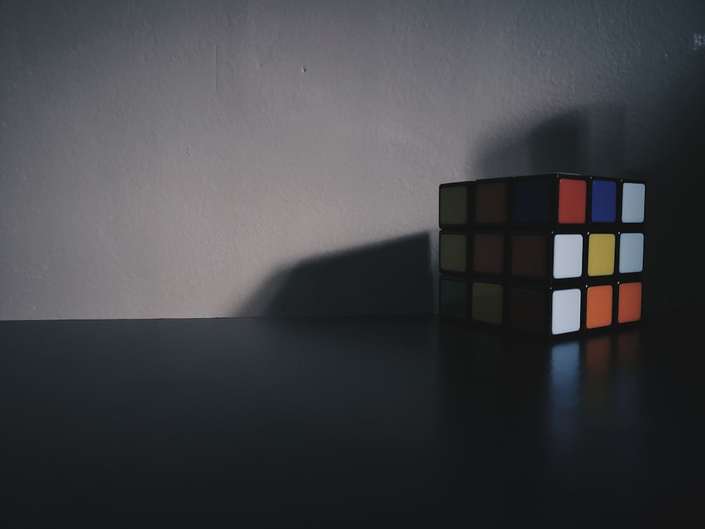 3 x 3 rubiks cube on black table